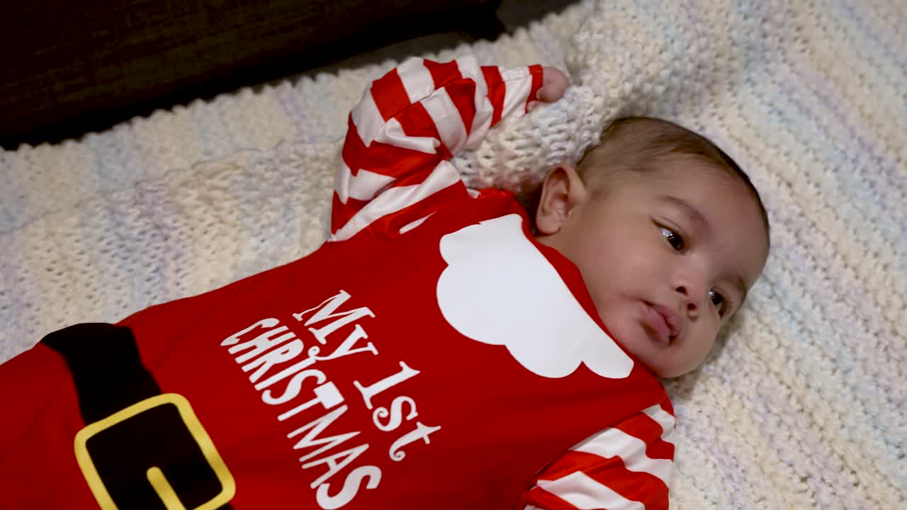 Cute Two Month Old Baby Boy Dressed In My 1st Christmas Outfit Laying On Blanket