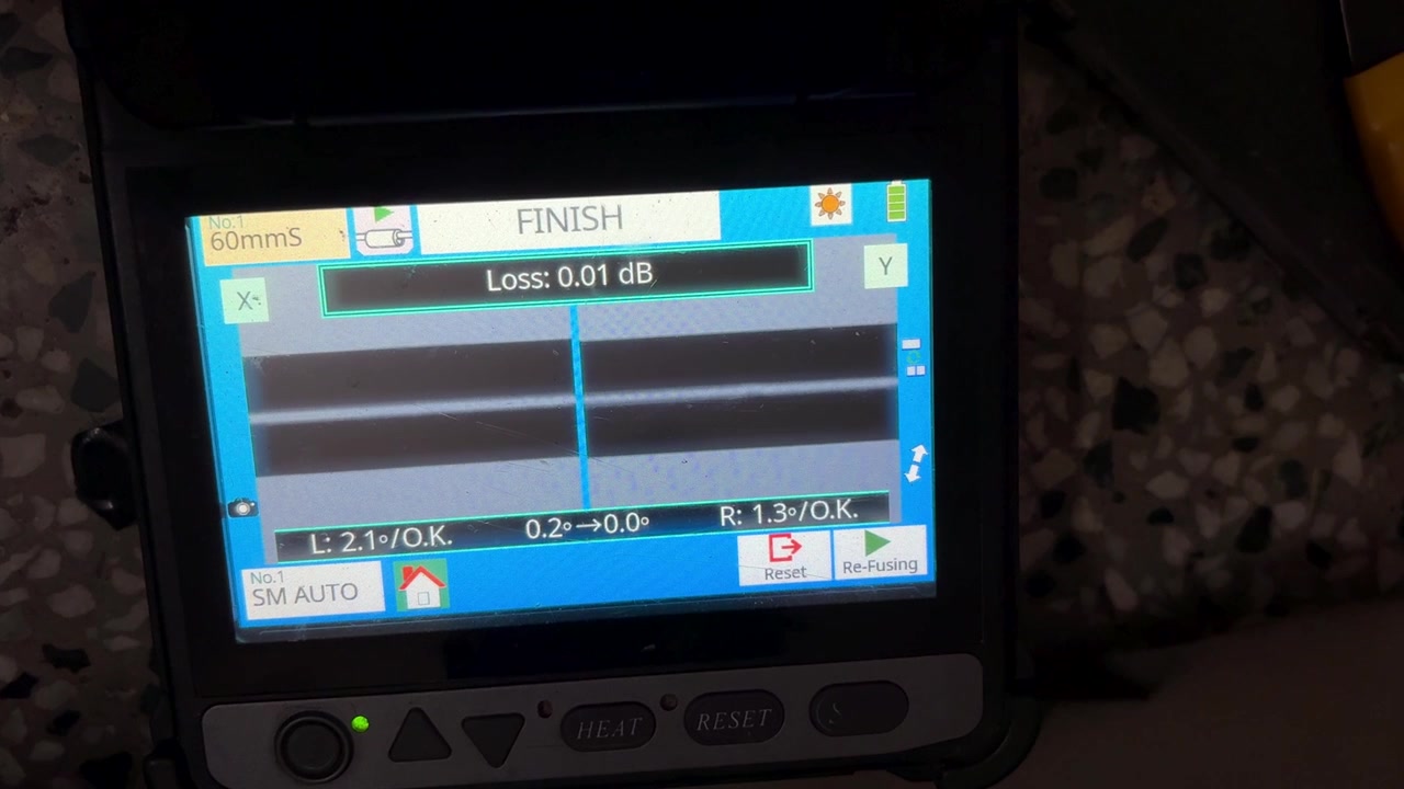 Close Up Of Fiber Optic Cable Repair Using Professional Fusion Splicing Machine