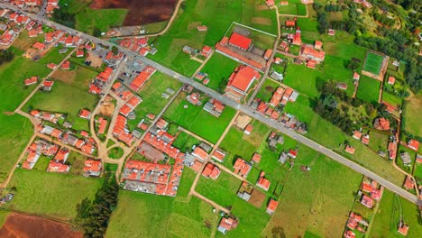 aerial view over houses in the guatavita town in sunny cundinamarca, colombia