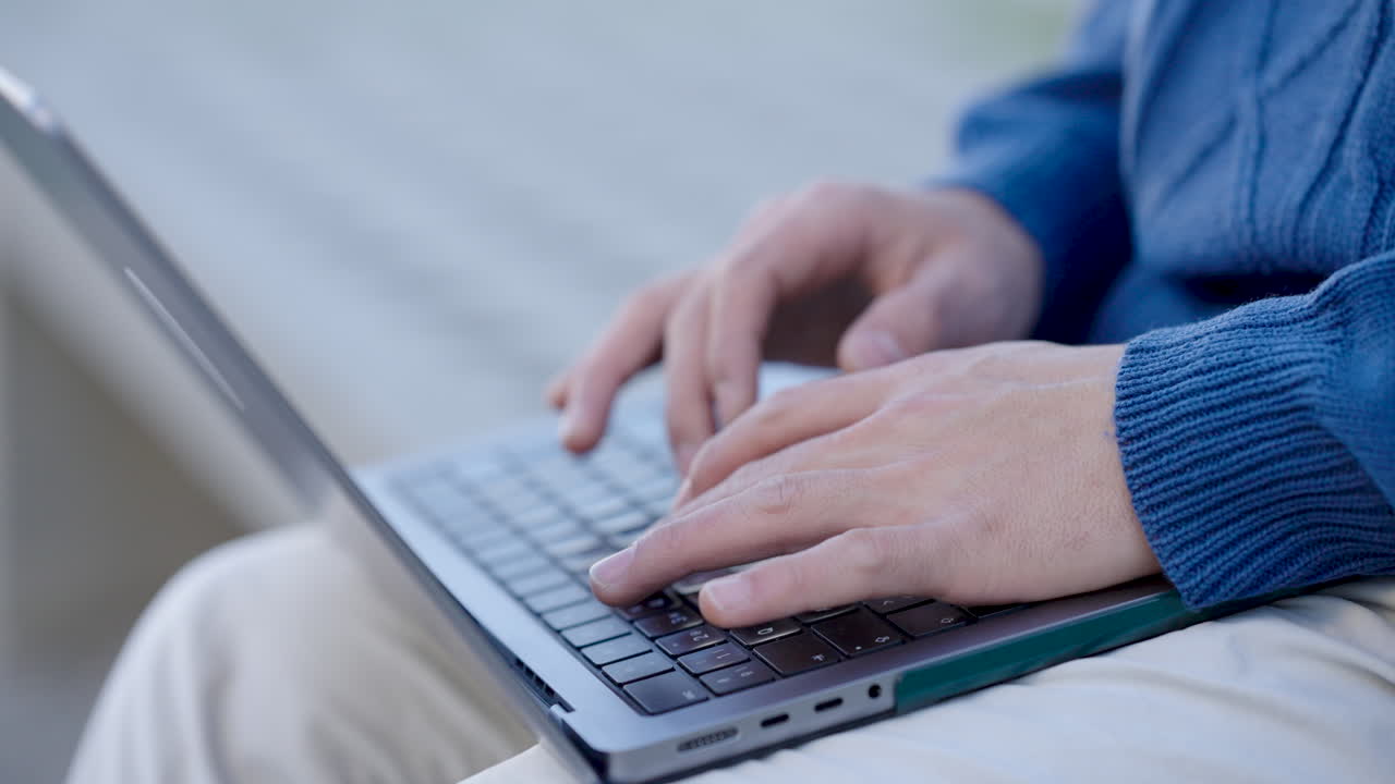 Programmer writing code on laptop keyboard montage