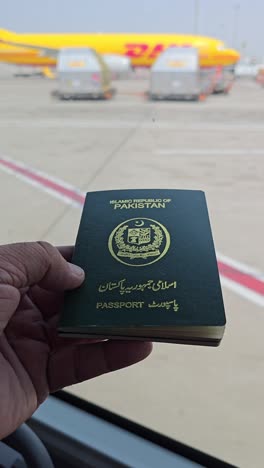 holding a pakistani passport at the airport