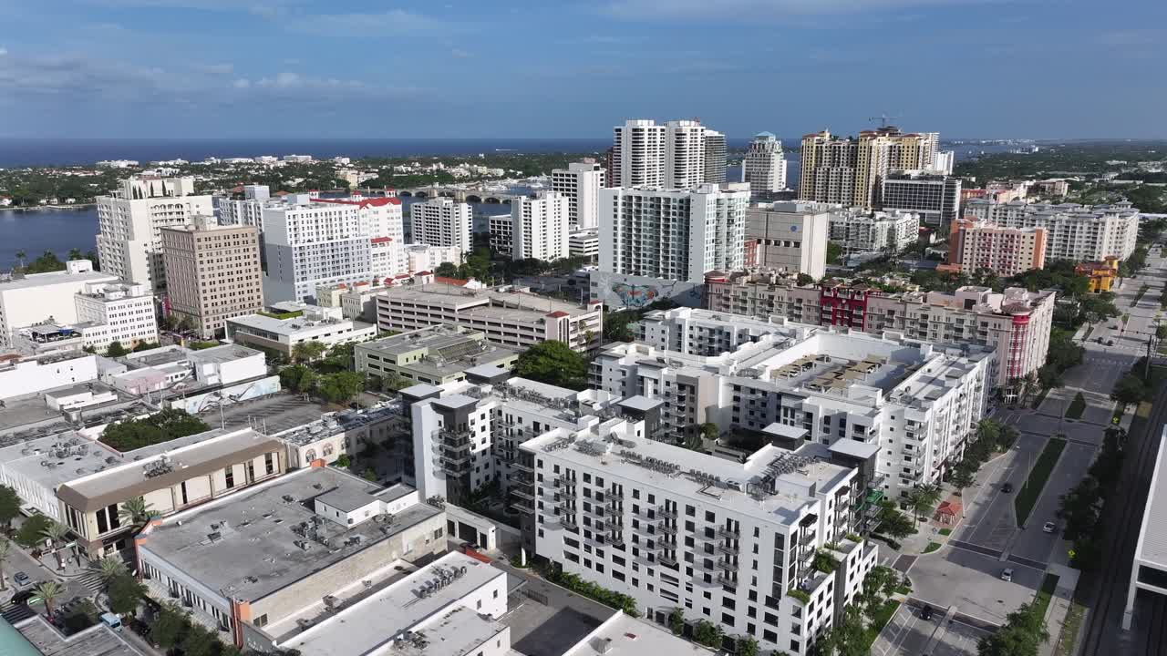 Aerial View of a Coastal City with Modern Buildings