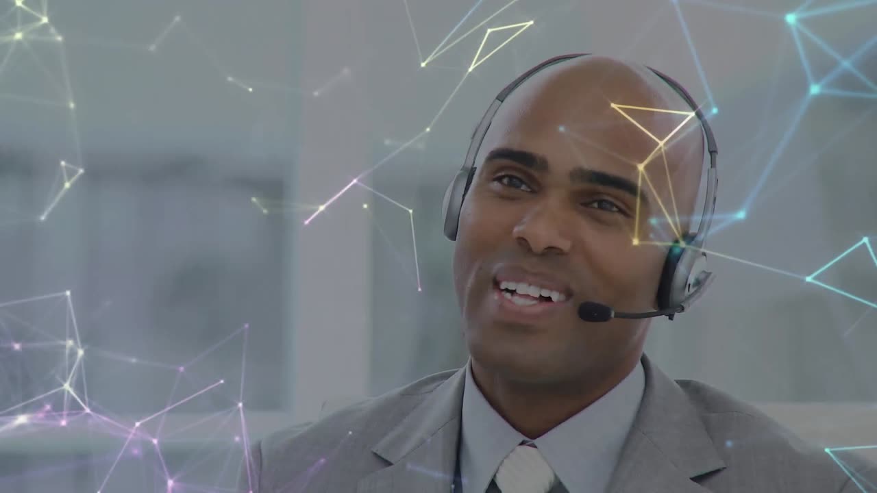 Animation of network of connections over businessman with headset in office