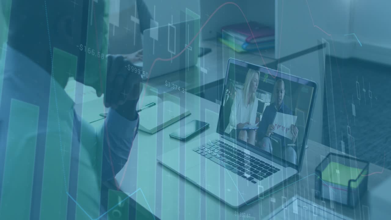 Man lifting smartphone to ear during remote finance call, typing laptop with charts animating
