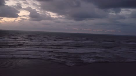 Incredible-aerial-panorama-of-sunrise-in-Itanhaem-beach-in-Brazil,-4k-drone