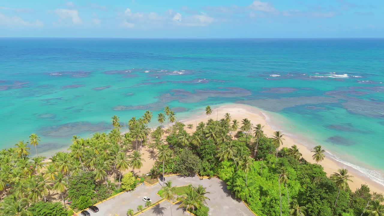 Beautiful view of Punta Popy Beach, Las Terrenas, with its turquoise sea, golden sand, and tropical landscapes that capture the essence of paradise