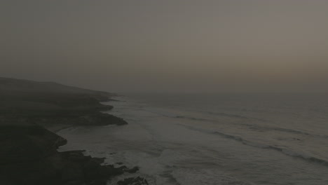 apple prores 422 coast of fuerteventura canary islands with waves and car on rock