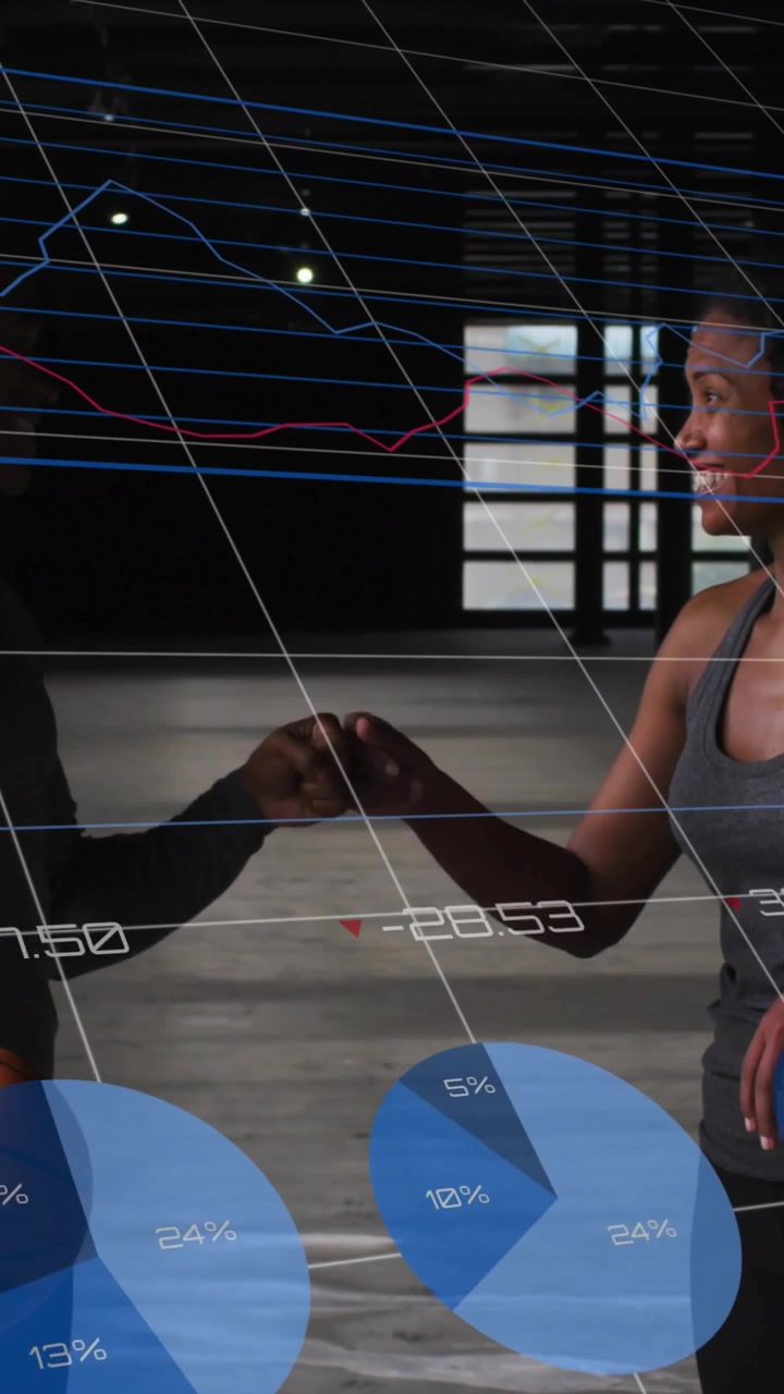 Vertical video: Man passing basketball to woman, pass starting blue charts for training handshake