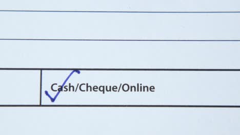 ticking a box on a form for cash/cheque/online payment options