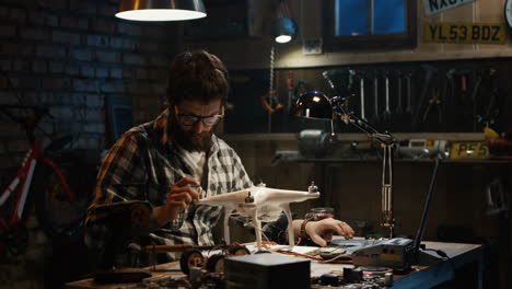 repairing a drone in a home workshop