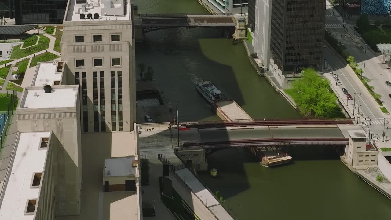 View of Chicago from above showing buildings, park, and waterway
