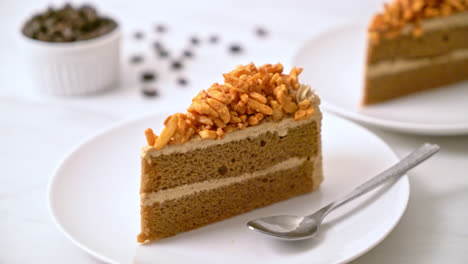 homemade coffee almonds cake on white plate