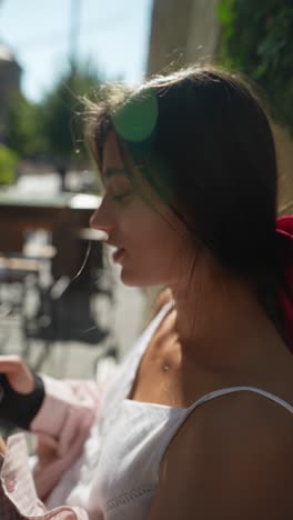 woman outdoors using phone