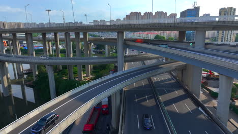 aerial photography of urban overpasses with cars coming and going, urban traffic