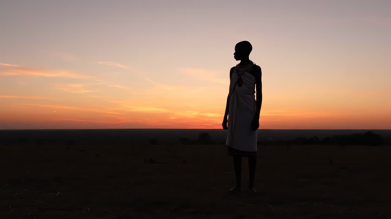 Maasai silhouette at sunset