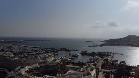 Drone-rising-at-the-marina-by-Ibiza-town