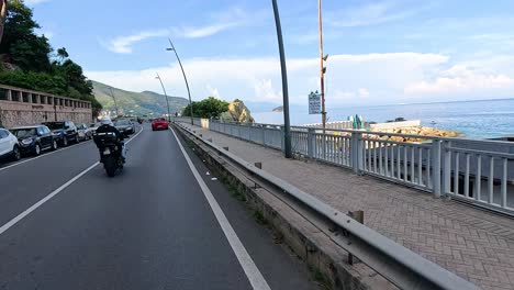 motorcycle ride on scenic coastal road in italy