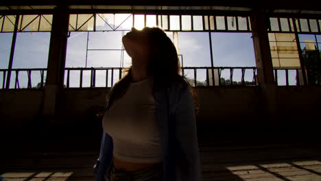 woman in an abandoned factory