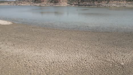 drone view of arid bottom of drying out river. ebro river in spain