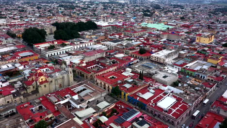 aerial close-up view of the city of the historical center of oaxaca in mexico, filmed by a drone with horizontal displacement