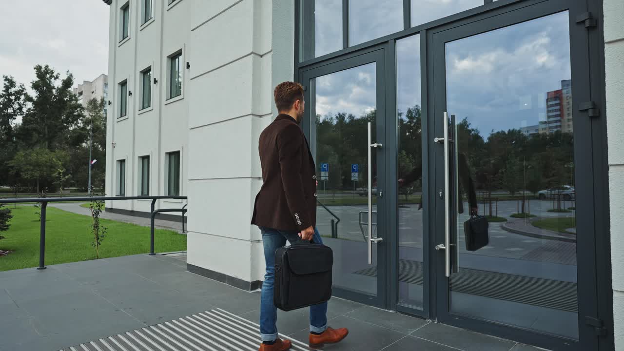 Businessman Leaving Office Building