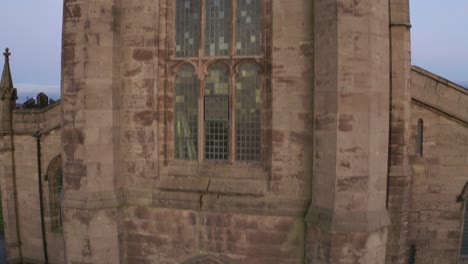 Aerial-view-of-St-Jame's-church-in-the-midlands,-Christian,-Roman-catholic-religious-orthodox-building-in-a-mainly-muslim-area-of-Stoke-on-Trent-in-Staffordshire,-City-of-Culture