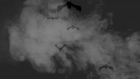 murciélagos por la noche con humo