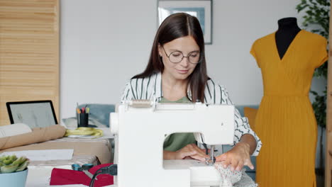 woman seamstress working on a dress