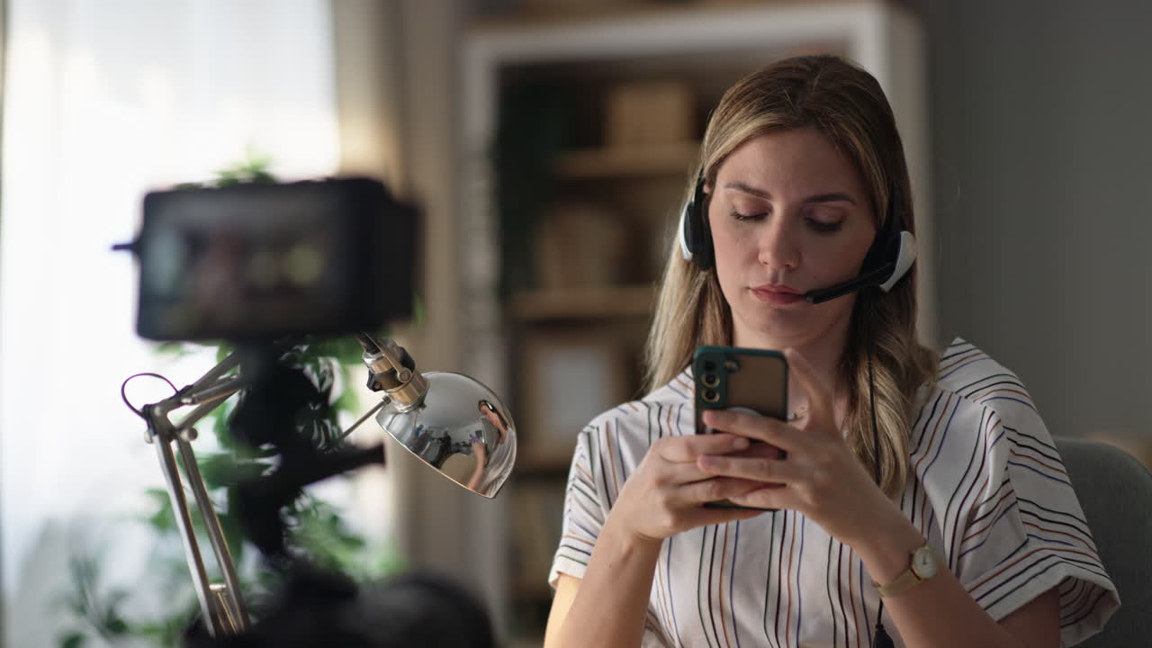 Woman with headset using phone