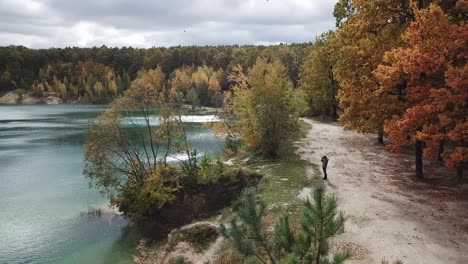 man taking pictures. aerial view of man taking photo of nature landscape