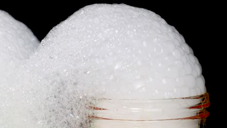 bubbles forming from dry ice in a jar