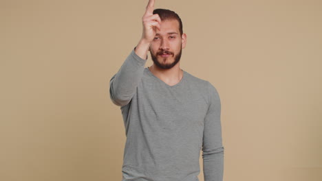 man pointing around with finger gun gesture making choice shooting killing pistol right on target