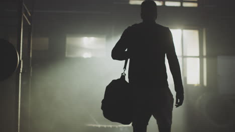 man leaving gym