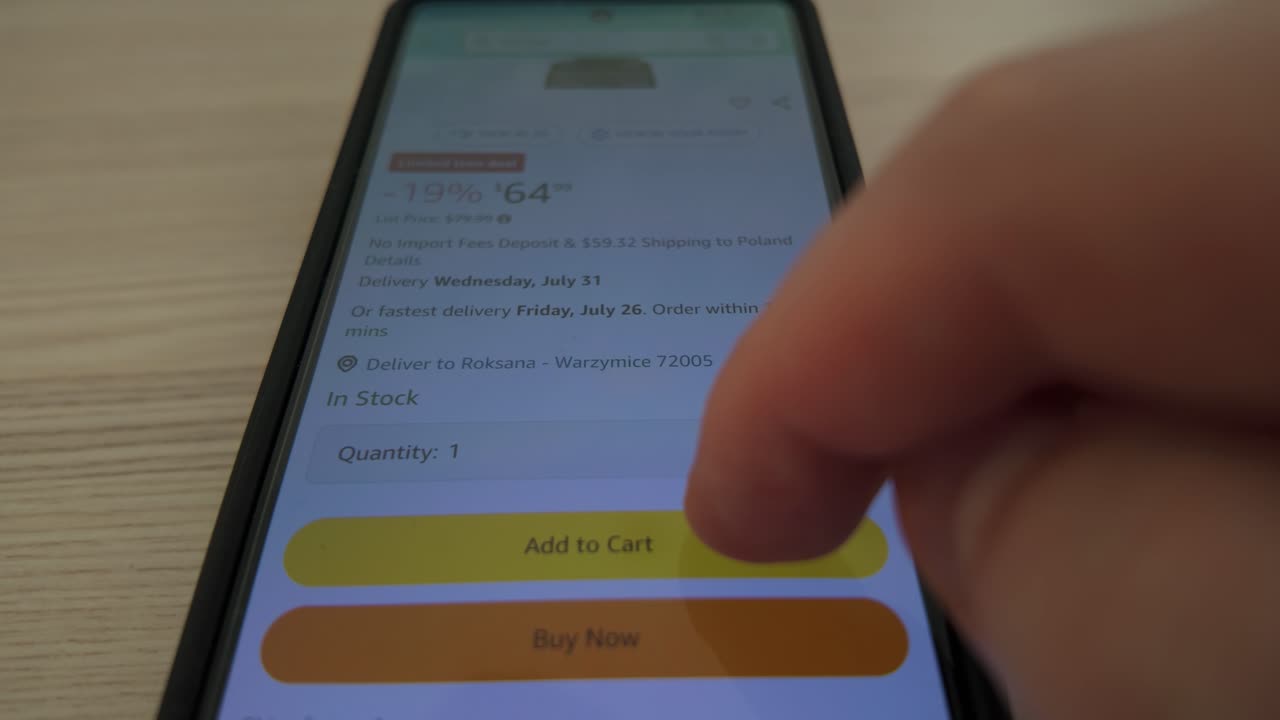 Browsing an online shopping app to add a vacuum cleaner to the cart on a mobile screen