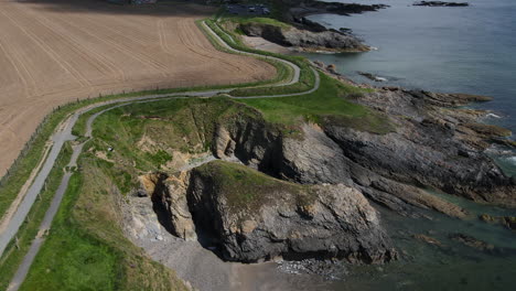 Drone-view-over-portrane-side-of-the-coastal-walk-in-North-Co-Dublin,-Ireland