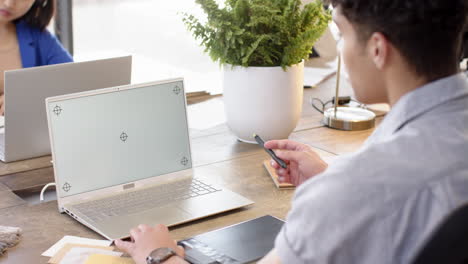 on video call, stylus and laptop, ma, interior design project at desk, copy space, at office