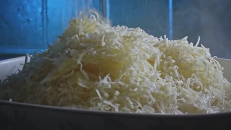 Pasta-and-cheese-is-cooked-and-then-tossed-with-freshly-grated-Parmesan-cheese