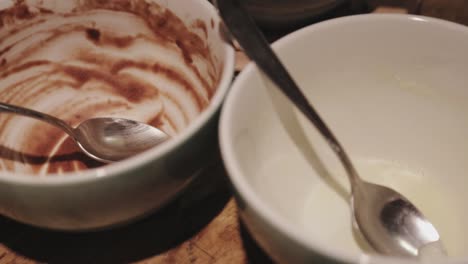 tilting shot of dirty dishes left on a table