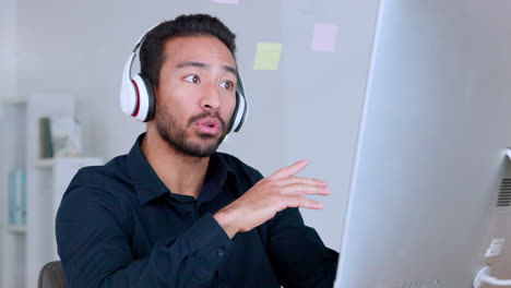 stressed businessman talking on computer video