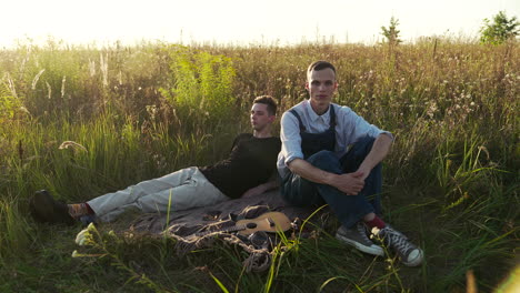 two men on a blanket