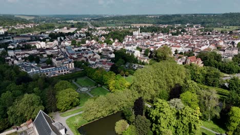 Drone-view-of-Coulommiers-city-with-lush-green-Parc-des-Capucins-in-France