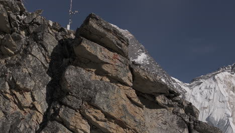 Aerial-drone-shot-revealing-Mount-Everest-from-Kalapatthar-on-the-Sagarmatha-National-Park-trek,-Nepal