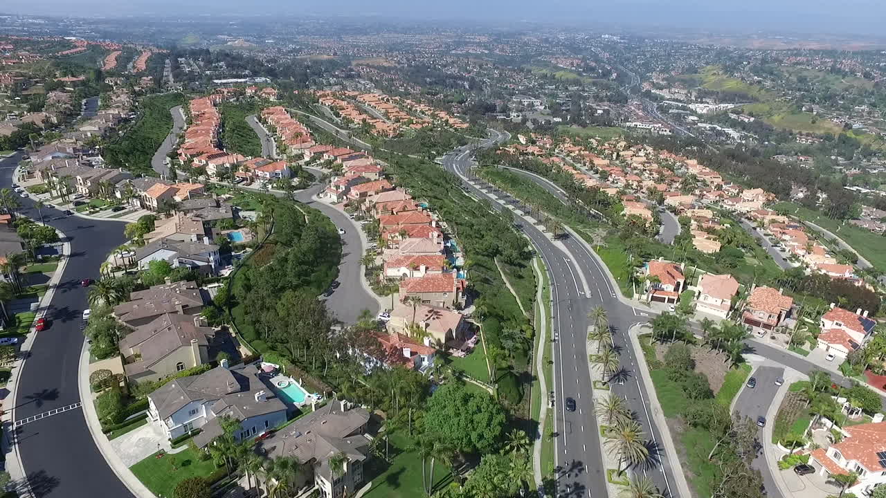 Aerial drone flyover of luxury homes over Laguna Niguel, Orange County, California