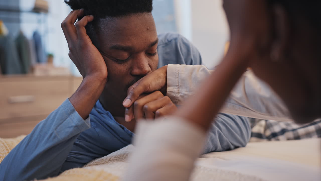 Kiss, talking and black couple on a bed