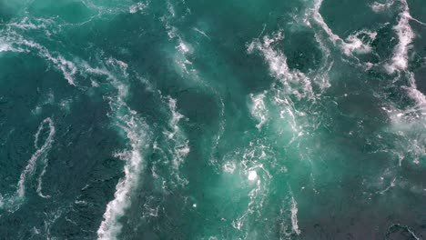 Waves-of-water-of-the-river-and-the-sea-meet-each-other-during-high-tide-and-low-tide.