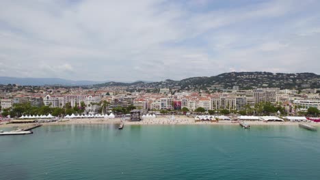 Tropical-Beach-Coastline-of-Cannes,-City-on-French-Riviera-Shoreline,-Aerial