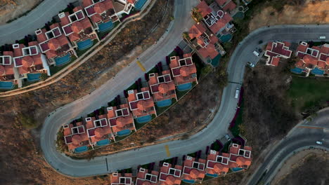 Downward-angle-cinematic-drone-shot-of-resort-villas-in-Cabo-Lucas-Mexico