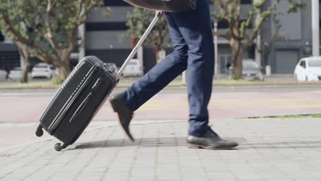 corporate traveling businessman walking