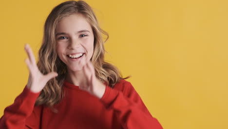 teenage caucasian girl fooling around in front of the camera.