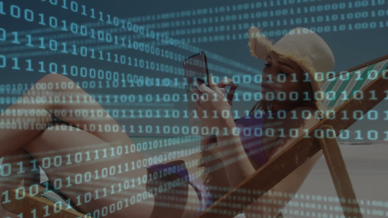 Woman using smartphone on sandy beach, showing animated binary code overlay for technology theme